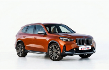 BMW X1 | Visione laterale | Colore Utah Orange