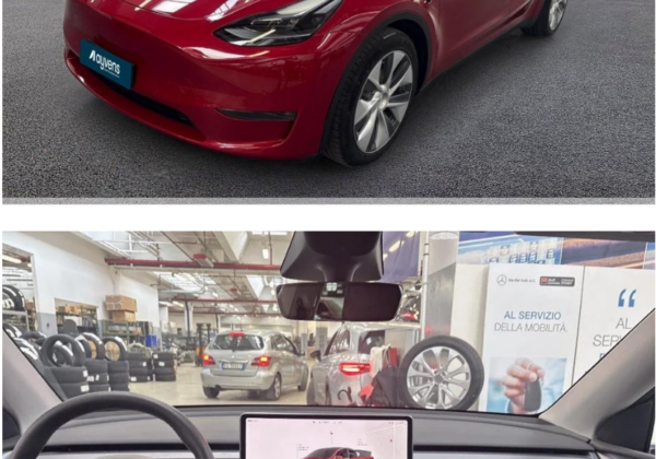 TESLA MODEL Y di colore rosso, visone dall'esterno frontalmente e visione interna sul volante.